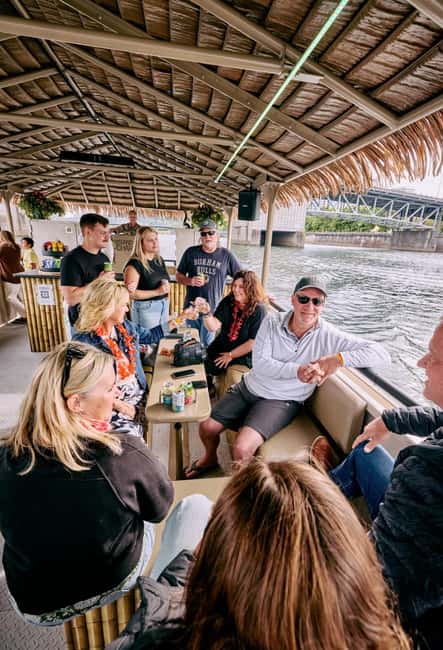 Tiki Nights & City Lights Portland River Party Boat (1-Hour) - Seating setup: open air views plus a covered palapa roof
